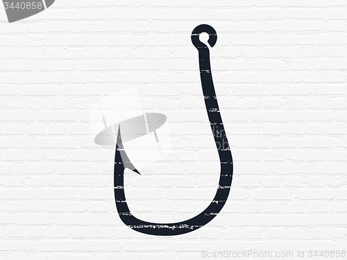 Image of Security concept: Fishing Hook on wall background