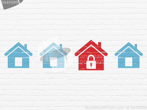Image of Safety concept: home icon on wall background