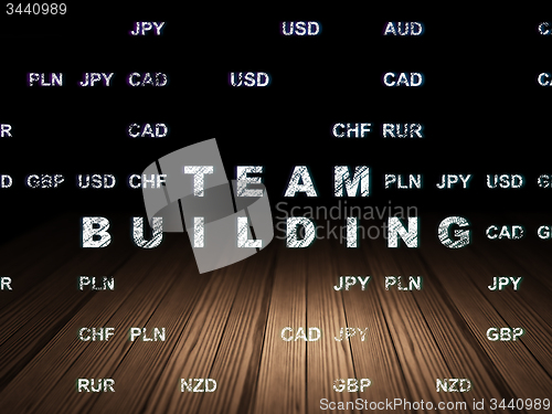 Image of Finance concept: Team Building in grunge dark room