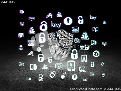 Image of Privacy concept: Broken Shield in grunge dark room
