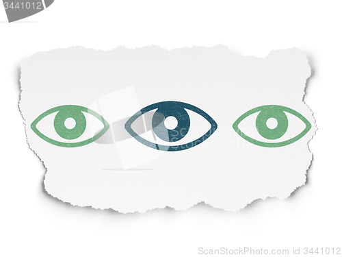 Image of Privacy concept: eye icon on Torn Paper background