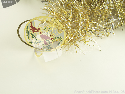 Image of delicate tree decoration and tinsel