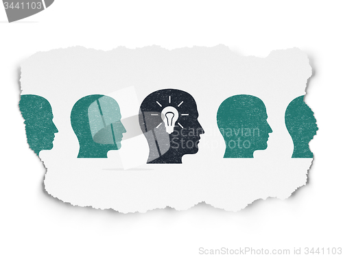 Image of Business concept: head with light bulb icon on Torn Paper background