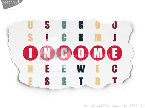 Image of Business concept: word Income in solving Crossword Puzzle