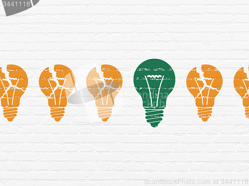Image of Business concept: light bulb icon on wall background