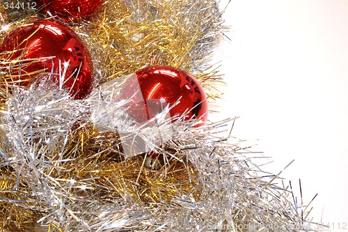 Image of red baubles and tinsel