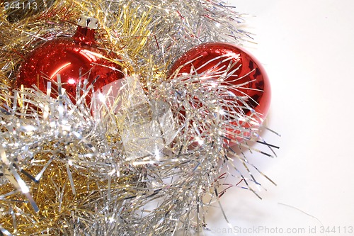 Image of red baubles and tinsel