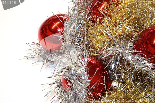 Image of red baubles and tinsel