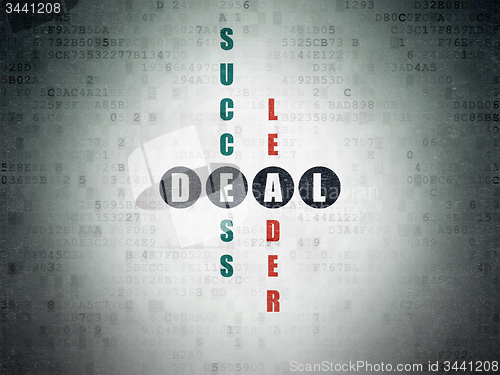 Image of Finance concept: word Deal in solving Crossword Puzzle