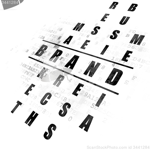 Image of Marketing concept: word Brand in solving Crossword Puzzle
