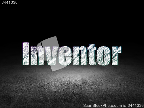 Image of Science concept: Inventor in grunge dark room