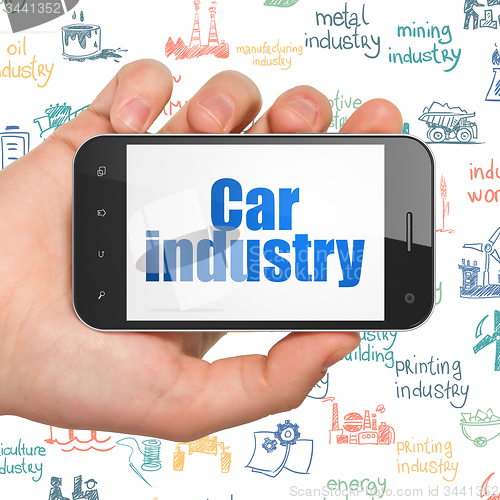 Image of Industry concept: Car Industry on Hand Holding Smartphone display