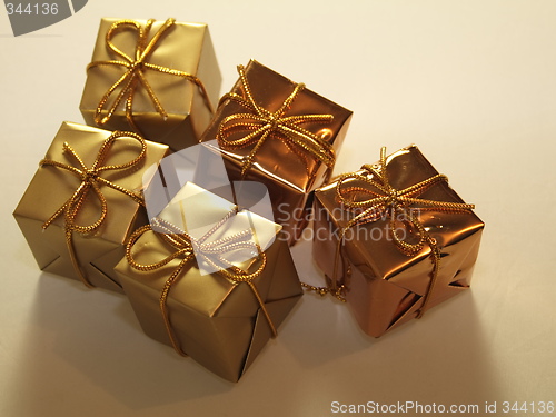 Image of five gold presents