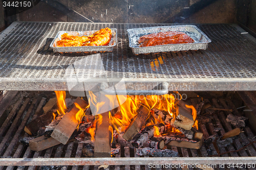 Image of Meat getting ready on bbq