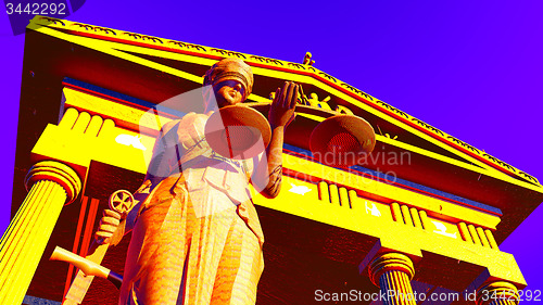 Image of Lady Justice in court