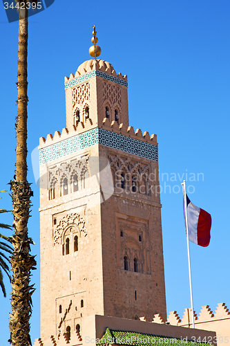 Image of history in maroc africa  minaret waving flag