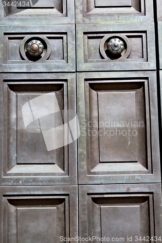 Image of in london antique brown door   and light