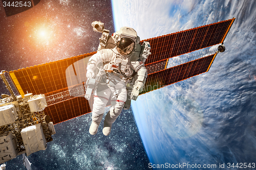 Image of International Space Station and astronaut.