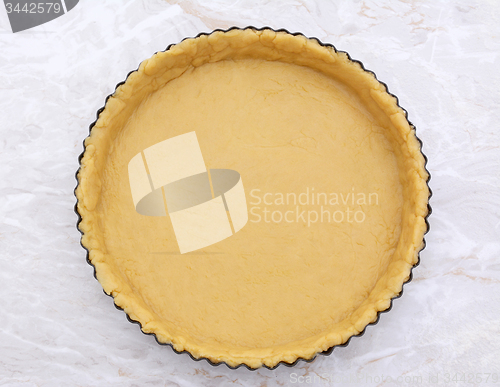 Image of Flan tin lined with shortcrust pastry