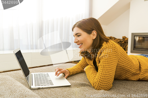 Image of Woman working with her laptop