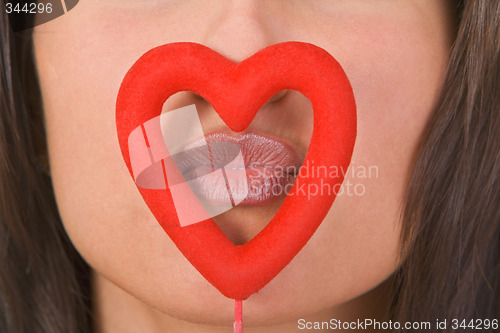 Image of Kissing through the heart