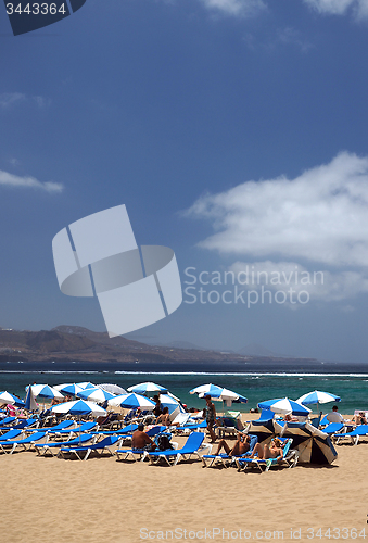 Image of editorial  tourists sunbathe on popular Las Canteras Beach in La