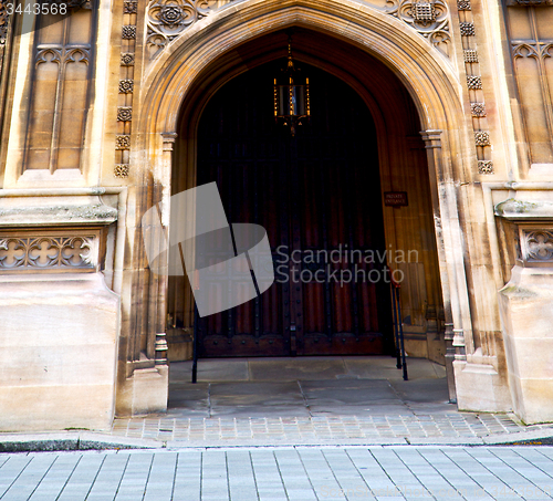 Image of parliament in london old church door and marble antique  wall