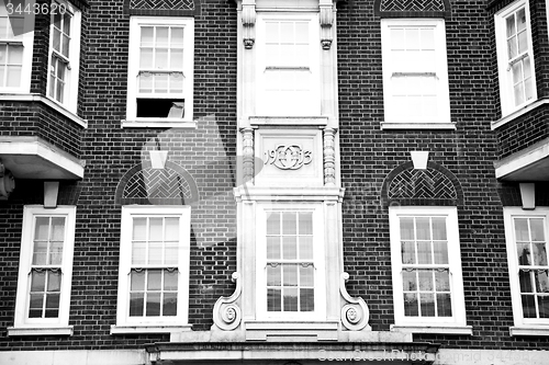 Image of old window in europe london  red brick wall and      historical 