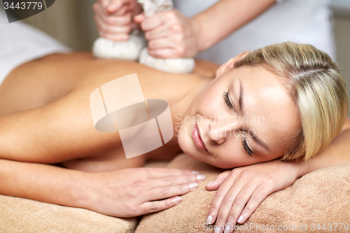 Image of close up of woman lying on massage table in spa