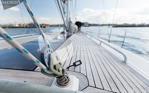 Image of close up of sailboat deck or yacht sailing on sea
