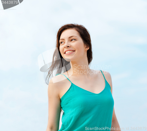 Image of girl standing on the beach