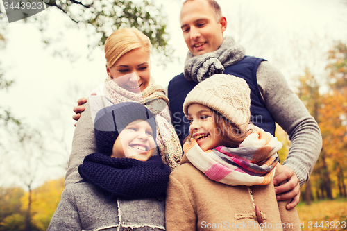 Image of happy family in autumn park