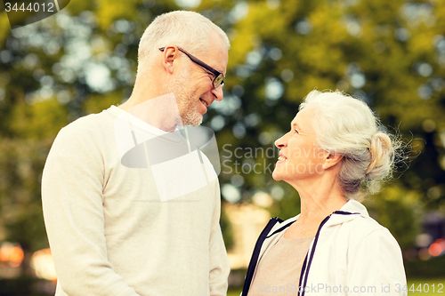 Image of senior couple in city park