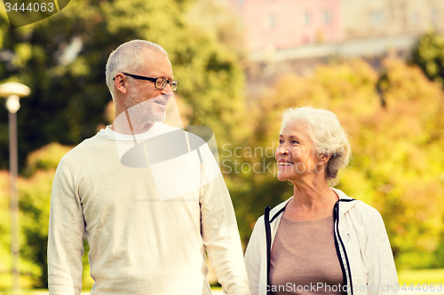 Image of senior couple in city park