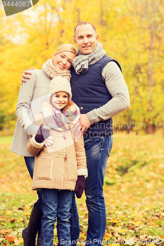 Image of happy family in autumn park