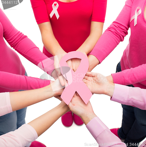 Image of close up of women with cancer awareness ribbons