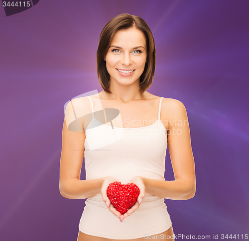 Image of beautiful woman in cotton underwear and red heart