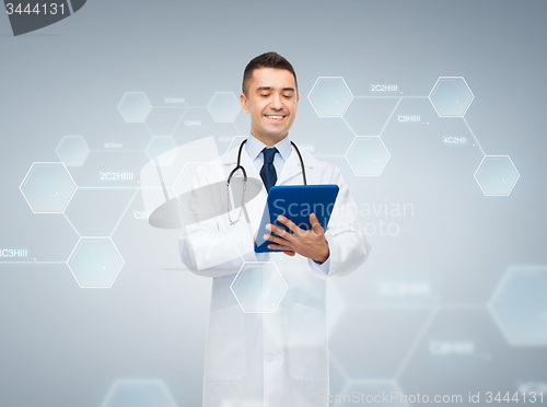 Image of male doctor with tablet pc and chemical formula