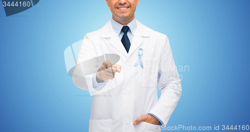 Image of happy doctor with prostate cancer awareness ribbon