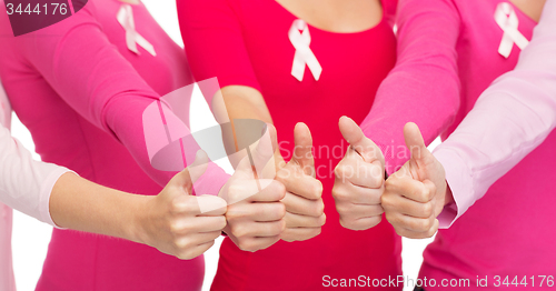 Image of close up of women with cancer awareness ribbons