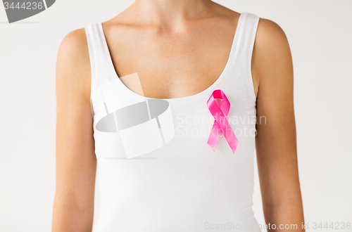 Image of woman with pink cancer awareness ribbon