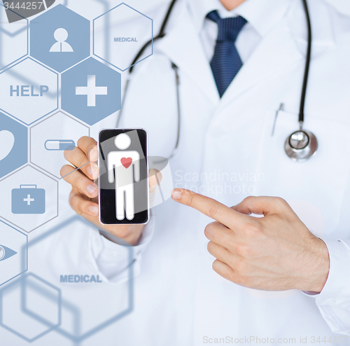 Image of male doctor with stethoscope and virtual screen