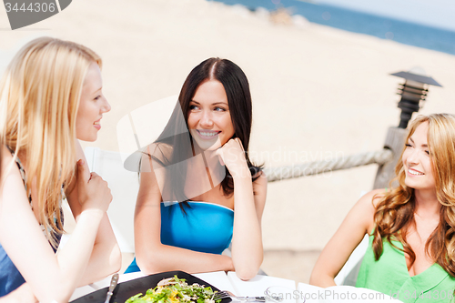 Image of girls in cafe on the beach