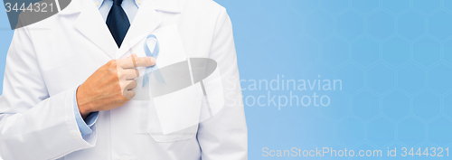 Image of doctor hand with prostate cancer awareness ribbon