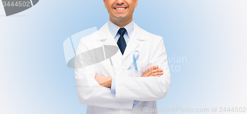 Image of happy doctor with prostate cancer awareness ribbon