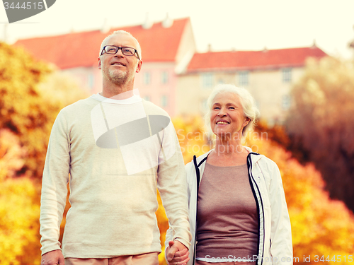 Image of senior couple in city park