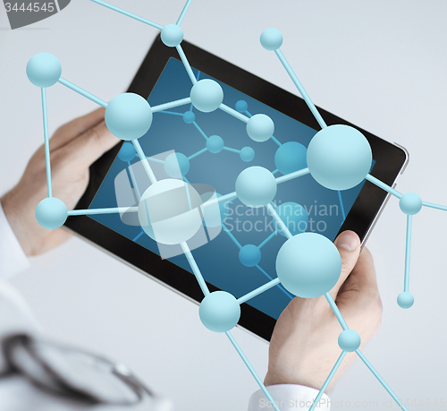 Image of close up of doctor with stethoscope and tablet pc