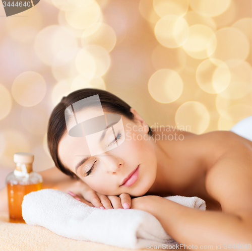 Image of happy woman in spa salon