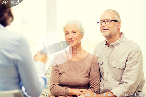 Image of happy senior couple at home