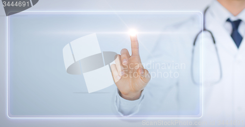 Image of male hand touching virtual screen